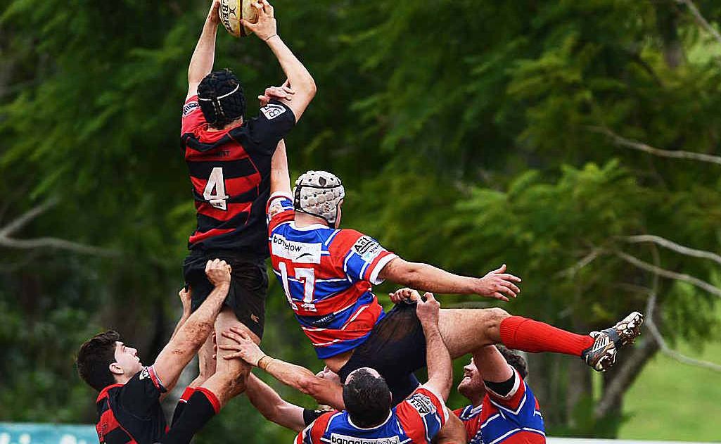 GOING AT IT: Wollongbar-Alstonville and Bangalow match up at Lyle Park, Wollongbar. GOING AT IT: Wollongbar-Alstonville and Bangalow match up at Lyle Park, Wollongbar.
